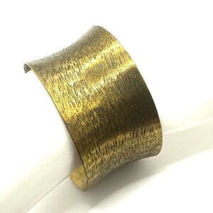 Gold tone open cuff bracelet